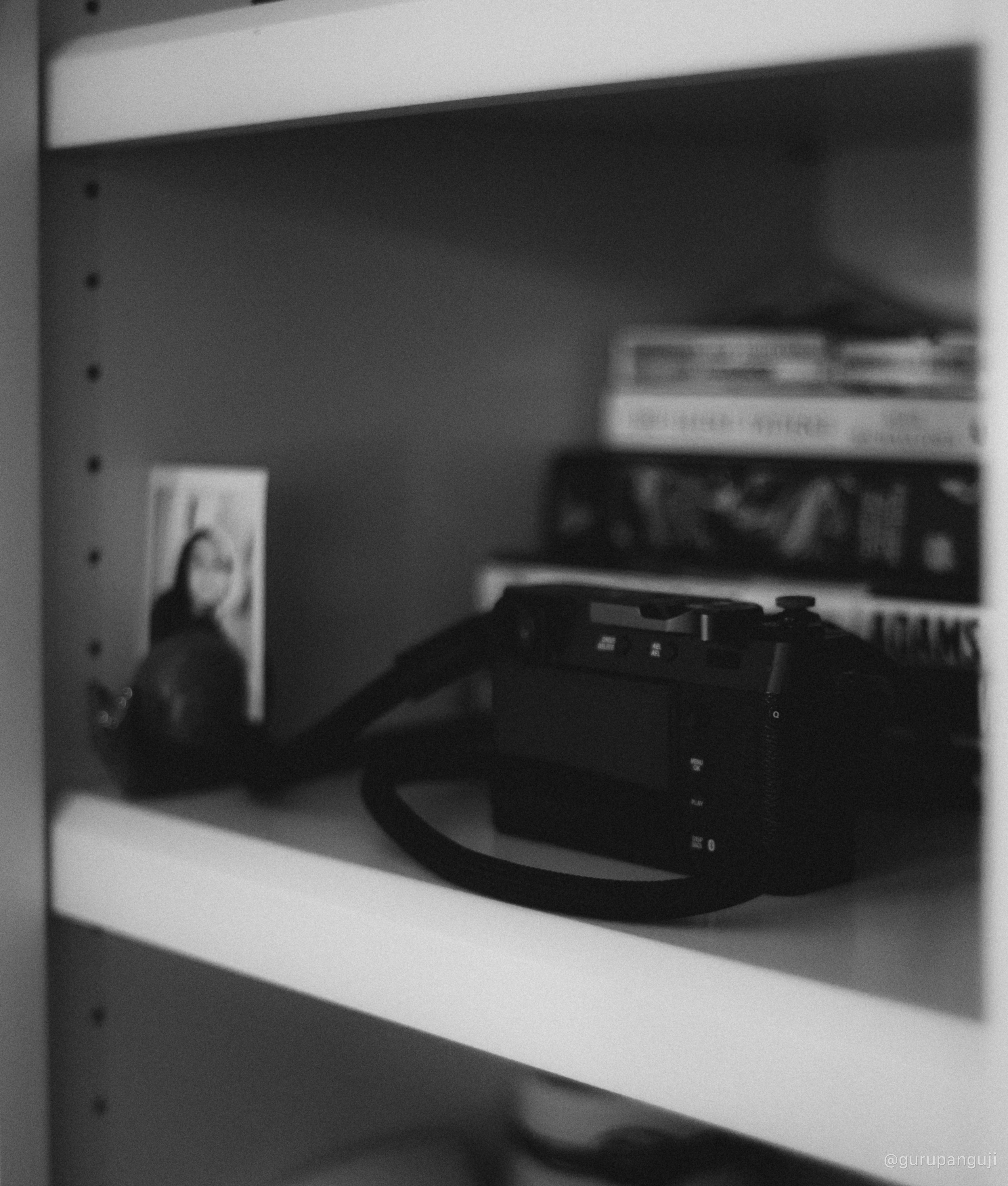 Fujifilm X100VI on a bookshelf, placed for quick everyday access