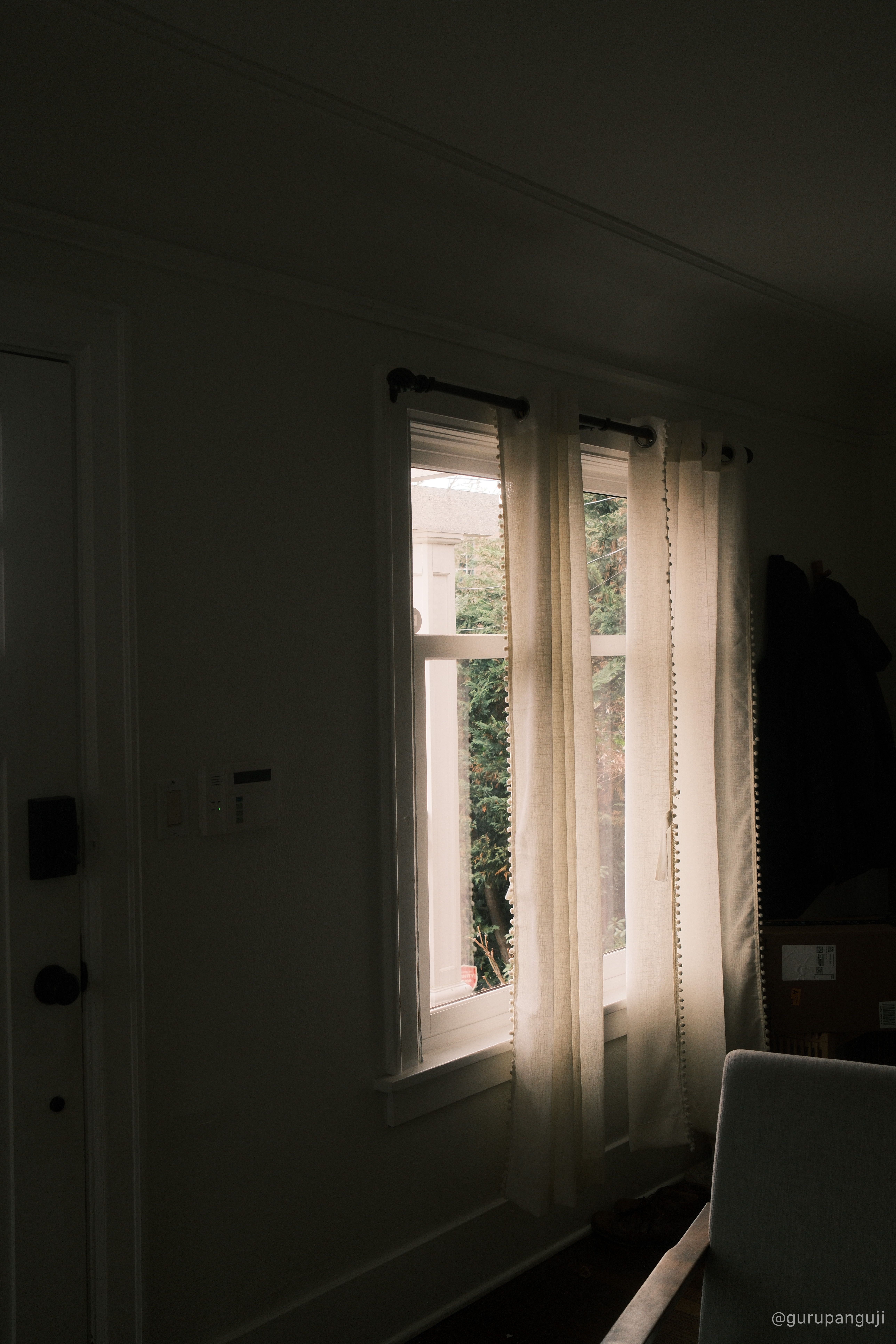 Close detail of the Fujifilm X100VI top plate and shutter button in use